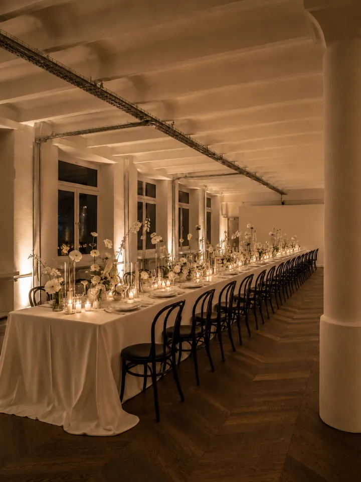 AI-generated: Festively set table with candles and white flowers