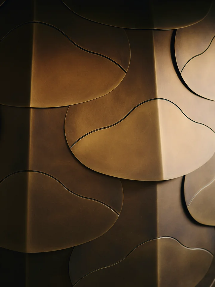 Detail of a bronze relief surface. Photo: Conny Mirbach